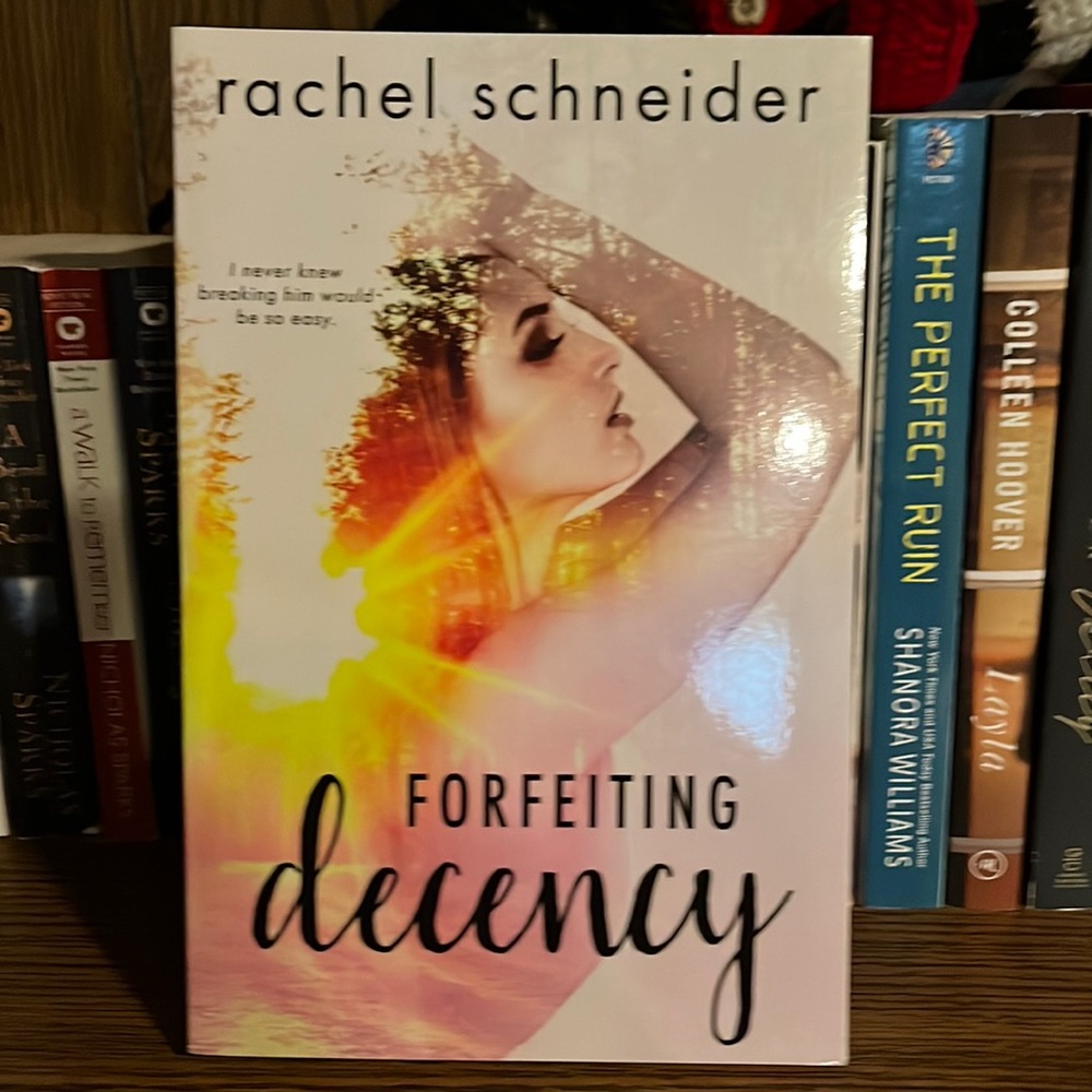 Signed! Forfeiting decency by Rachel Schneider